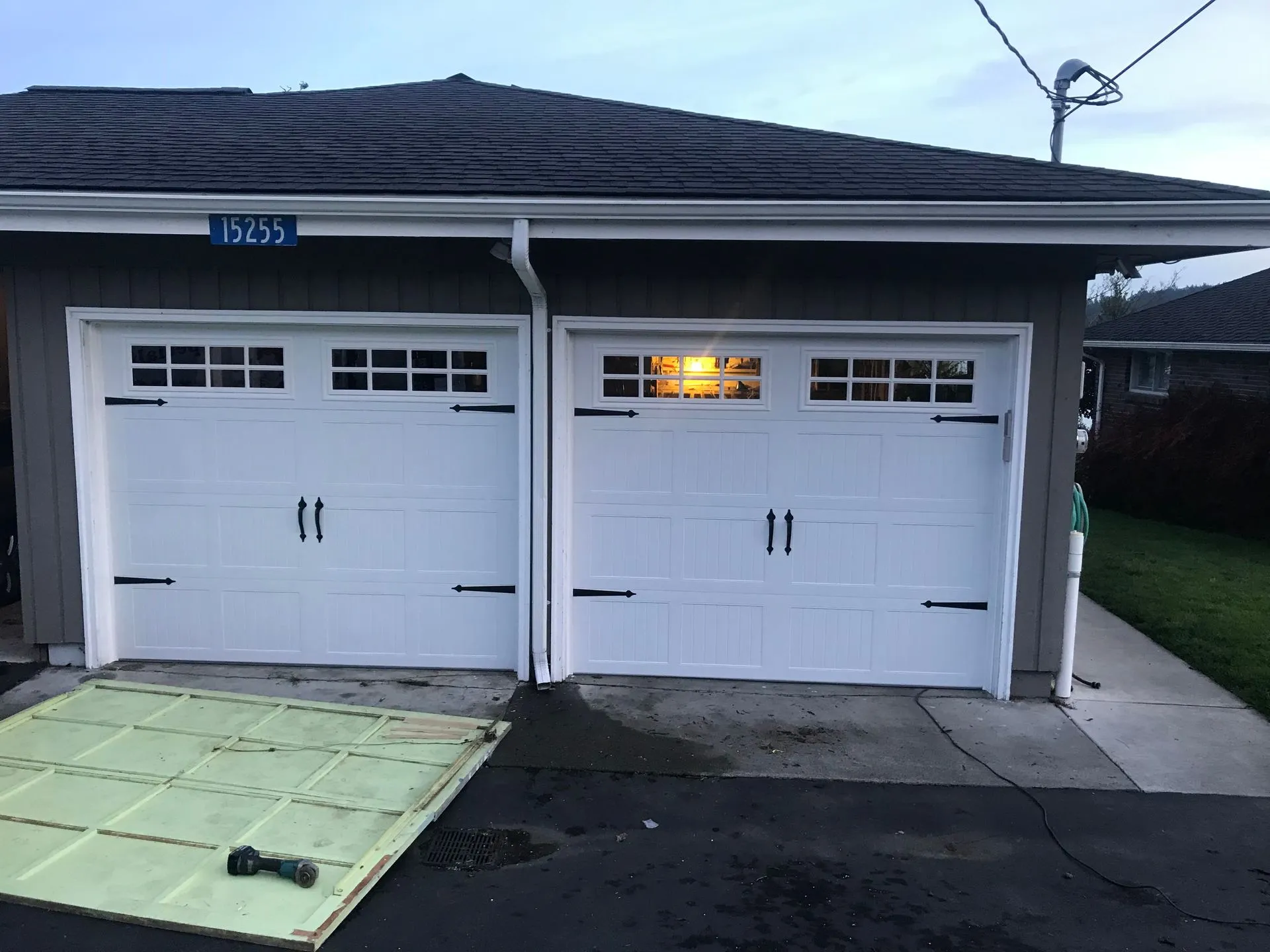 8x7 stamped carriage short-panel garage door with Stockton window inserts