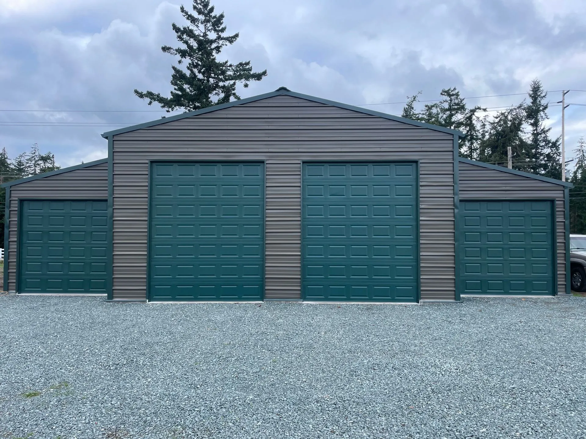 Three 9x9 and three 10x12 CHI model 2240 non-insulated commercial doors