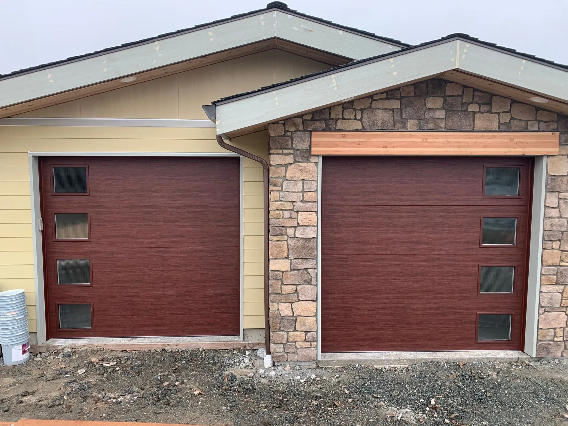 Clopay Ultra-Grain model 9208 door in cherry with reed glass