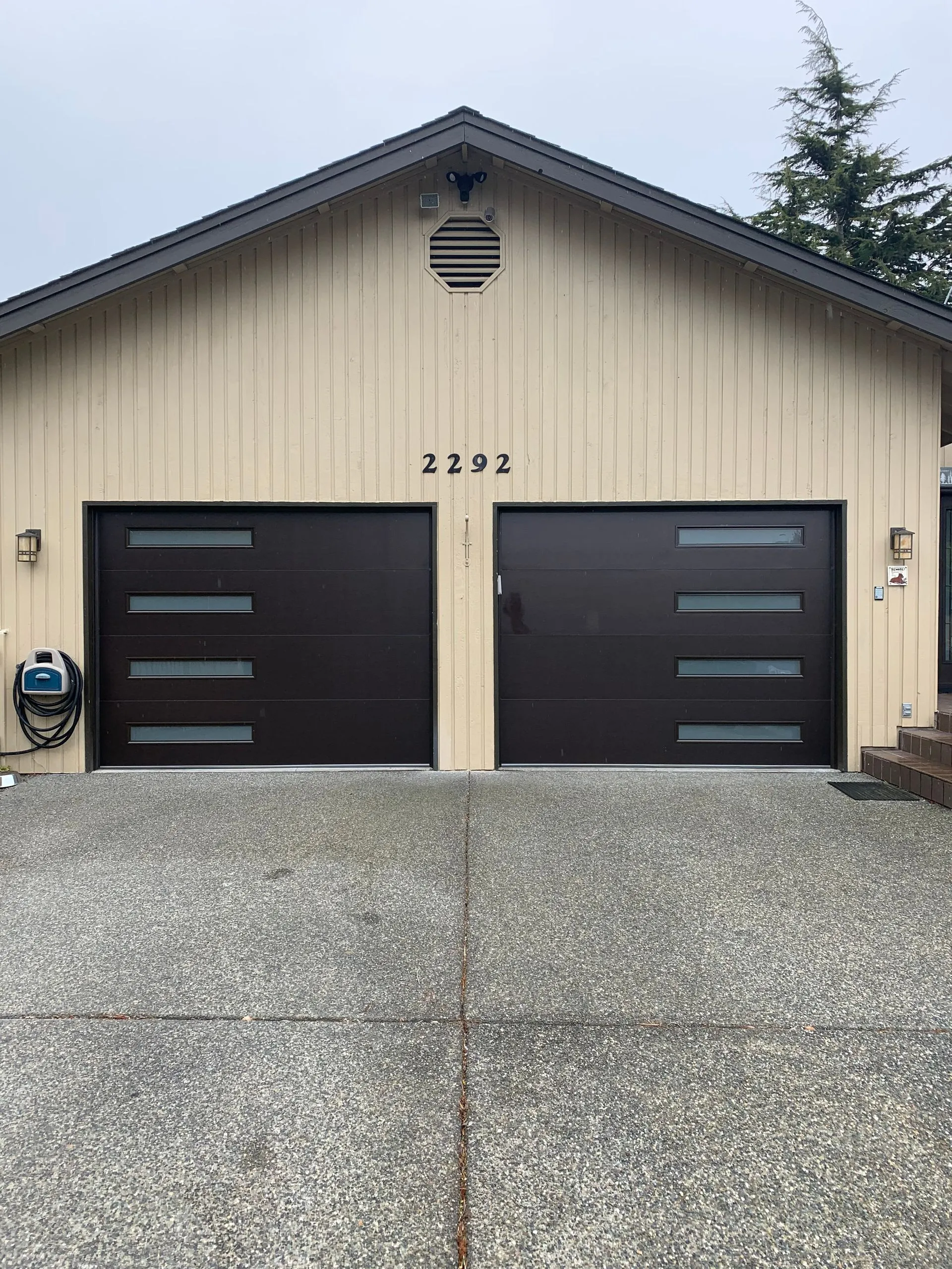 9x7 Northwest Door Modern Tech garage door in bronze with obscure glass