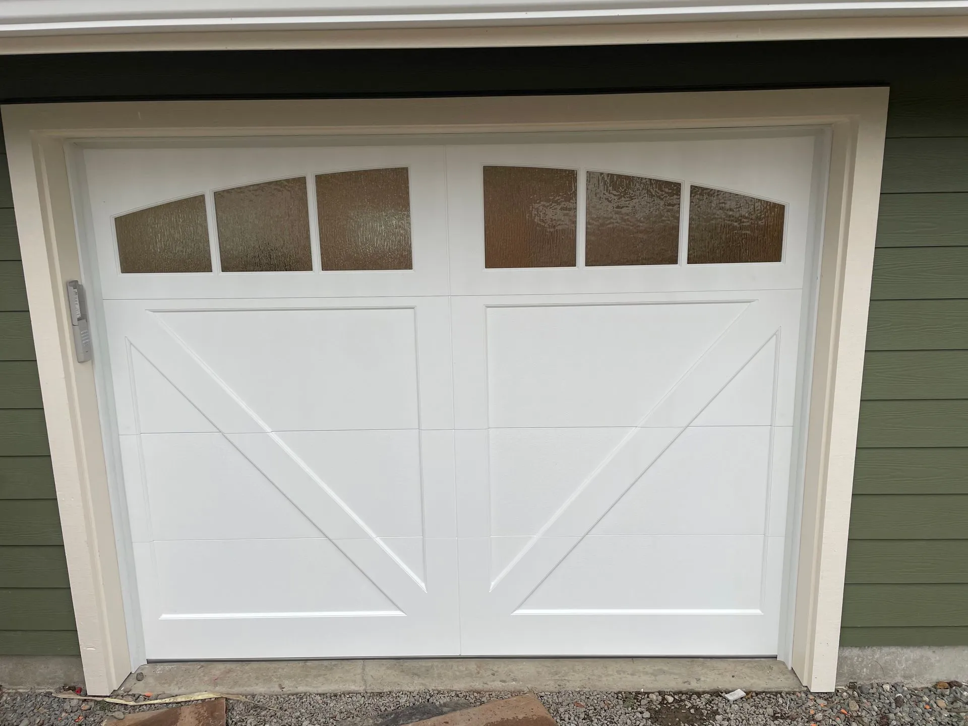 9x7 Northwest Door Therma Elite DV03A garage door with rain glass