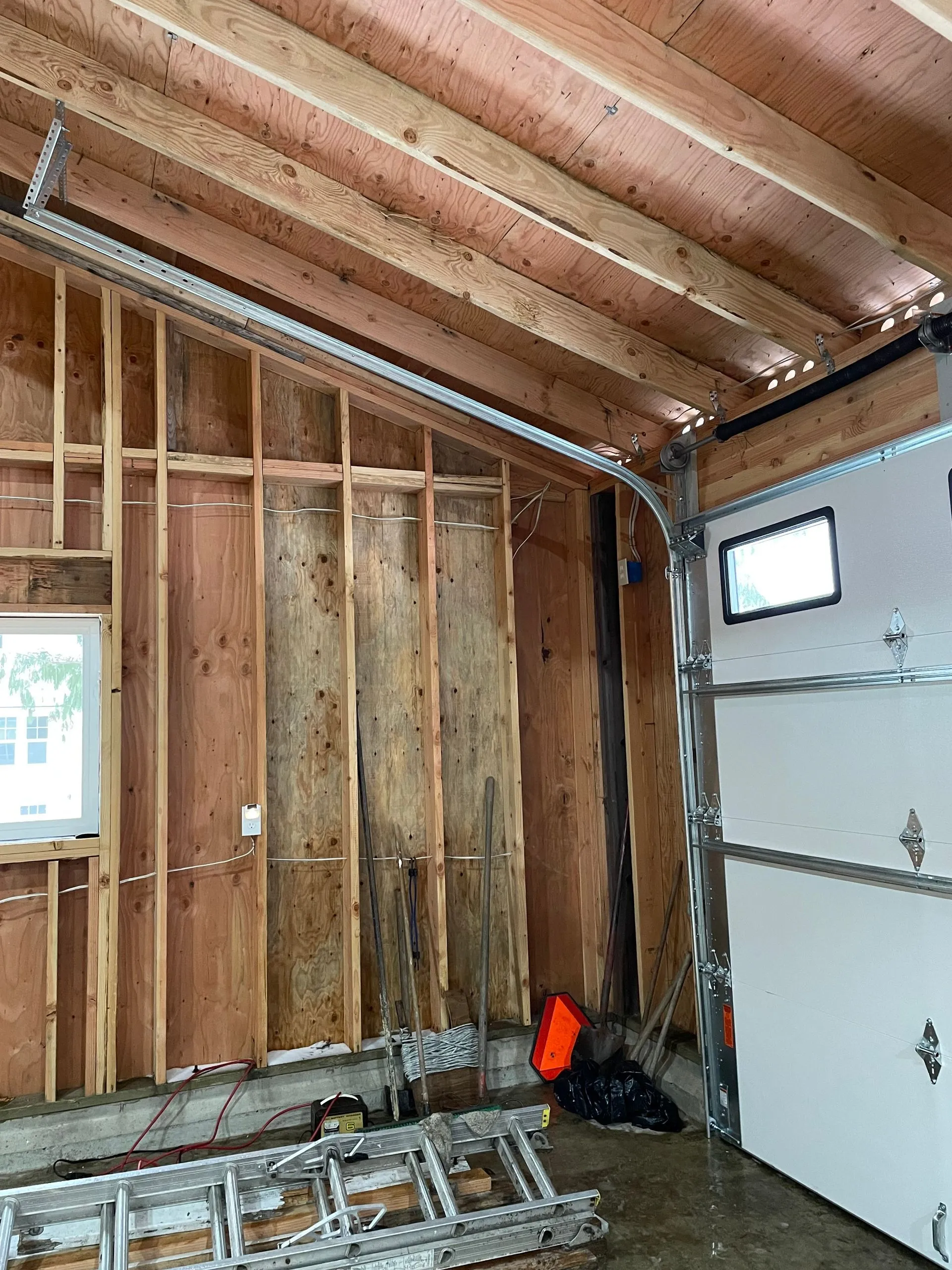 Pitch-rise track fitted to an 18x7 garage door