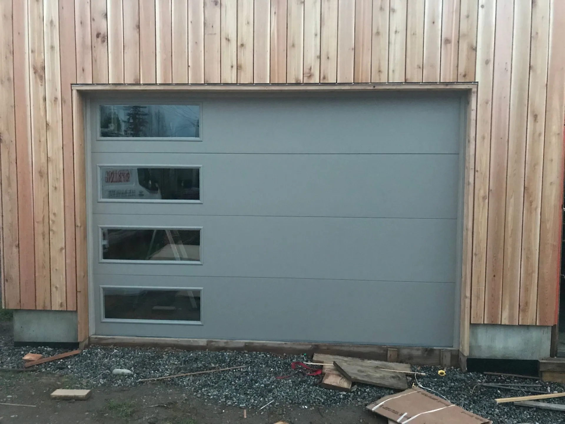 12x7 Vantage Flush door in sandstone with Harmony glass on the left